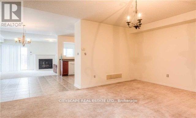 Upper - 5227 Tresca Trail, Mississauga, ON - Indoor Photo Showing Other Room With Fireplace