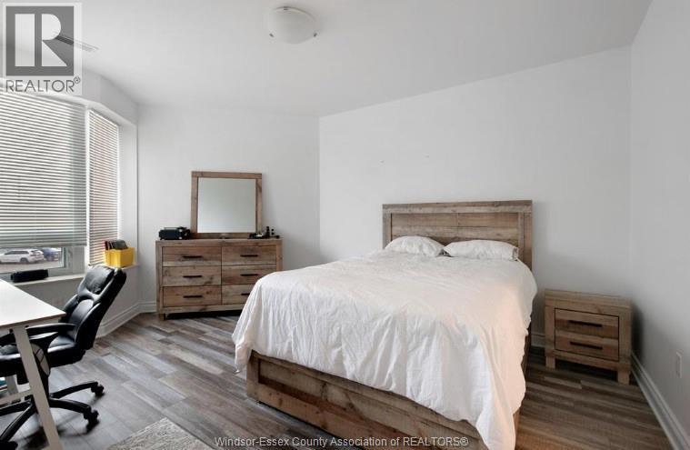 5055 Riverside Drive Unit# 201, Windsor, ON - Indoor Photo Showing Bedroom