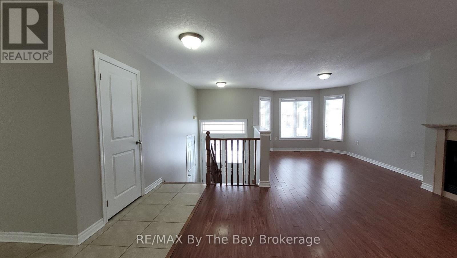 42 Tona Trail, Wasaga Beach, ON - Indoor Photo Showing Other Room With Fireplace