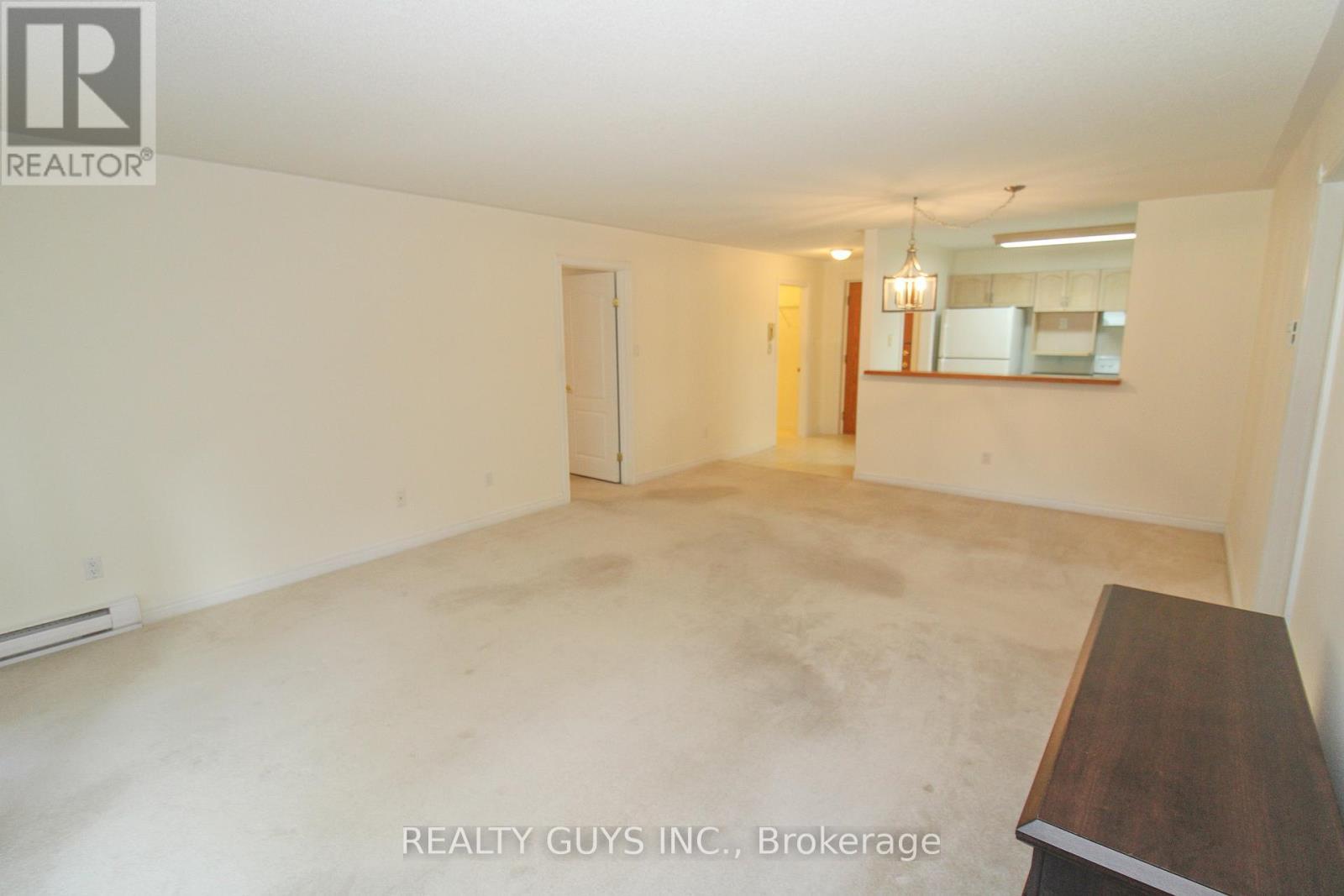 BEDROOM 2 ON LEFT - 4 - 693 Whitaker Street, Peterborough (Ashburnham Ward 4), ON - Indoor Photo Showing Other Room