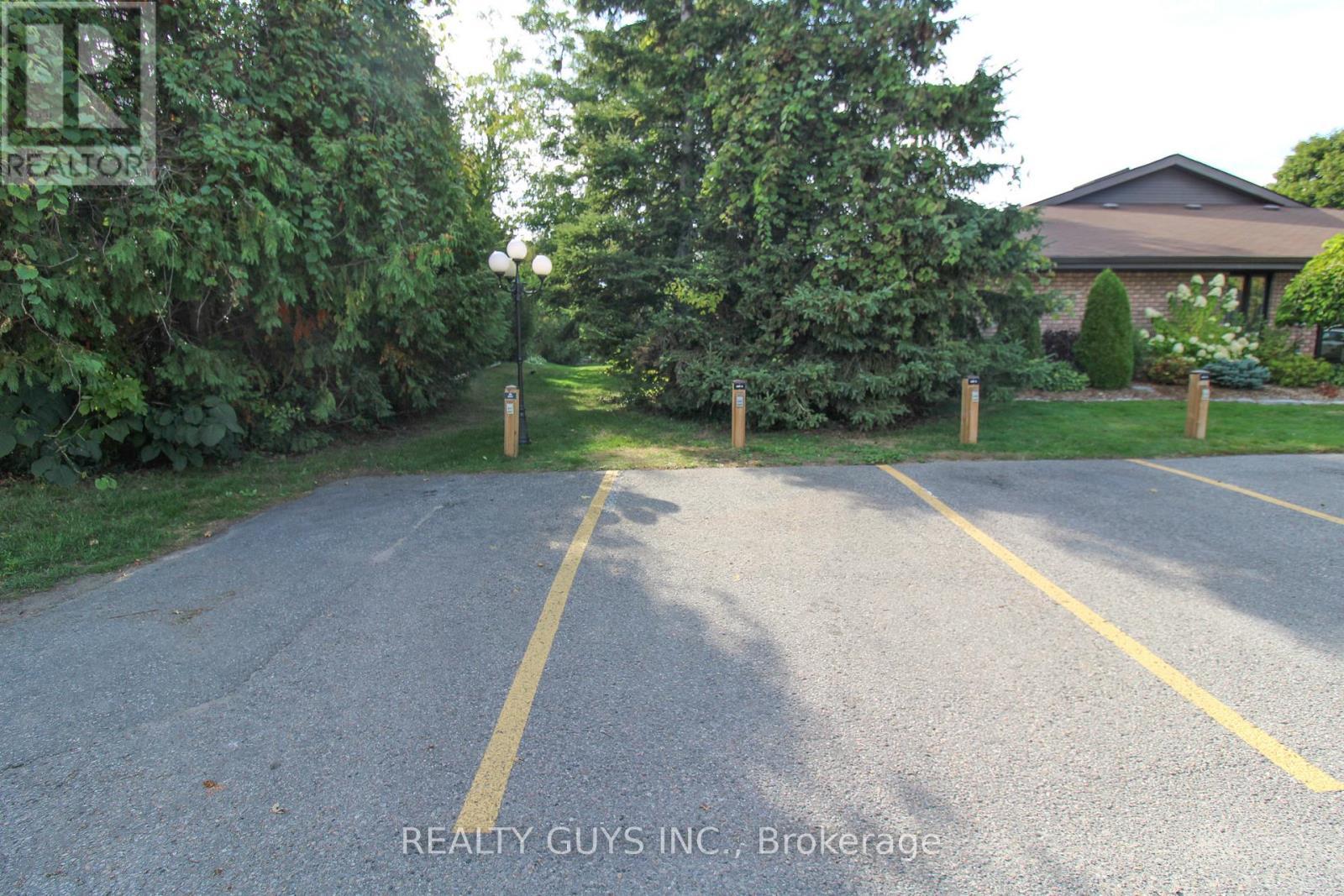 SUMMER PIC- PARKING SPOT - 4 - 693 Whitaker Street, Peterborough (Ashburnham Ward 4), ON - Outdoor