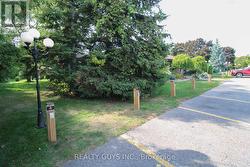 SUMMER PIC-VISITOR PARKING ON RIGHT -