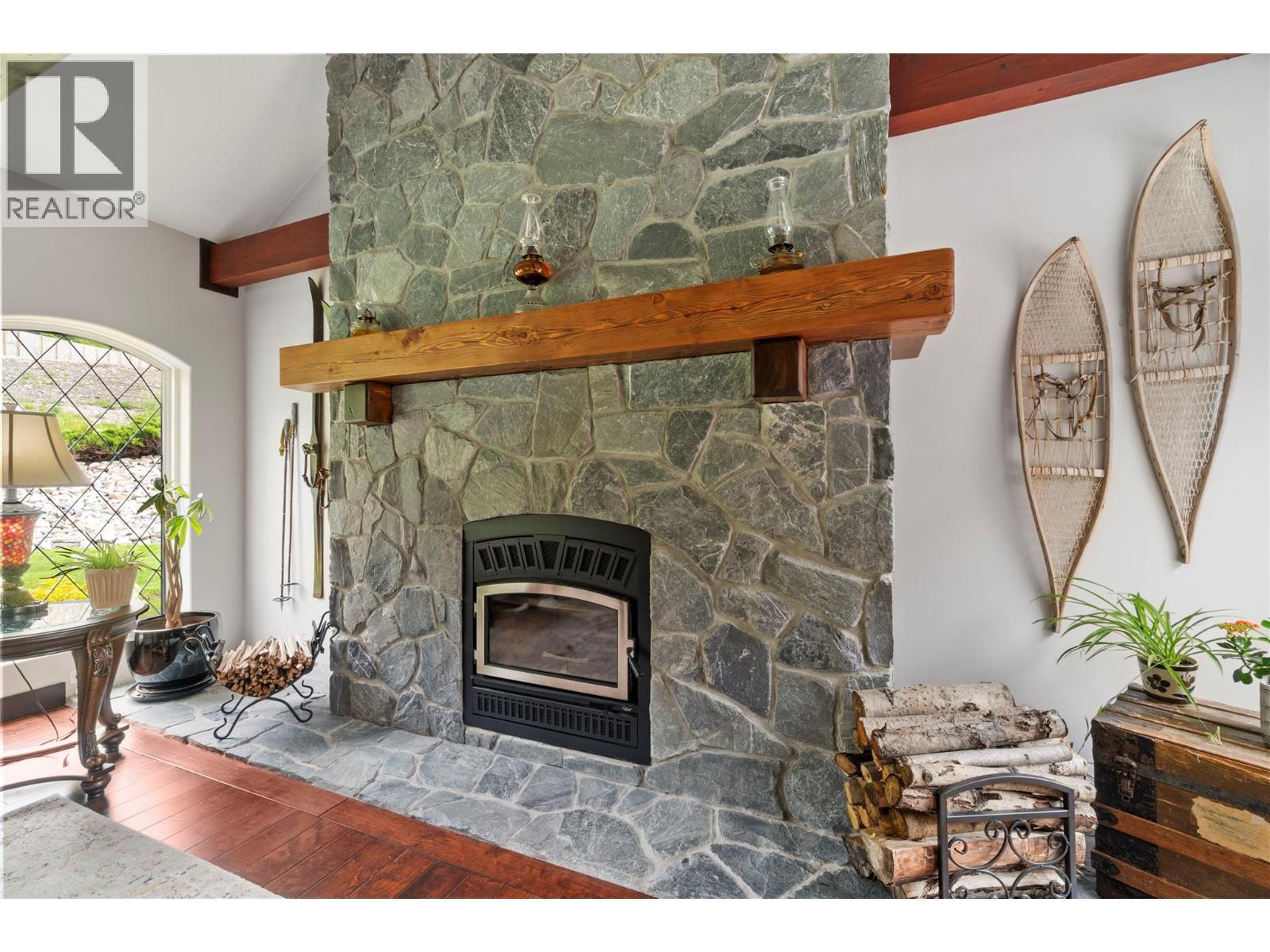 5121 Ivy Road, Eagle Bay, BC - Indoor Photo Showing Other Room With Fireplace