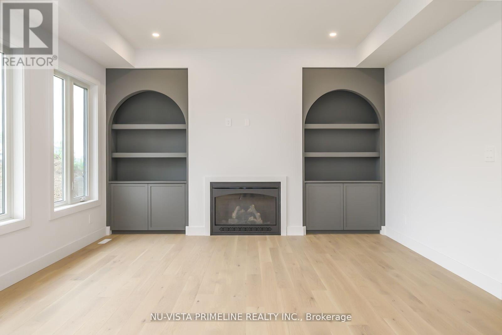 186 Timberwalk Trail, Middlesex Centre (Ilderton), ON - Indoor Photo Showing Living Room With Fireplace