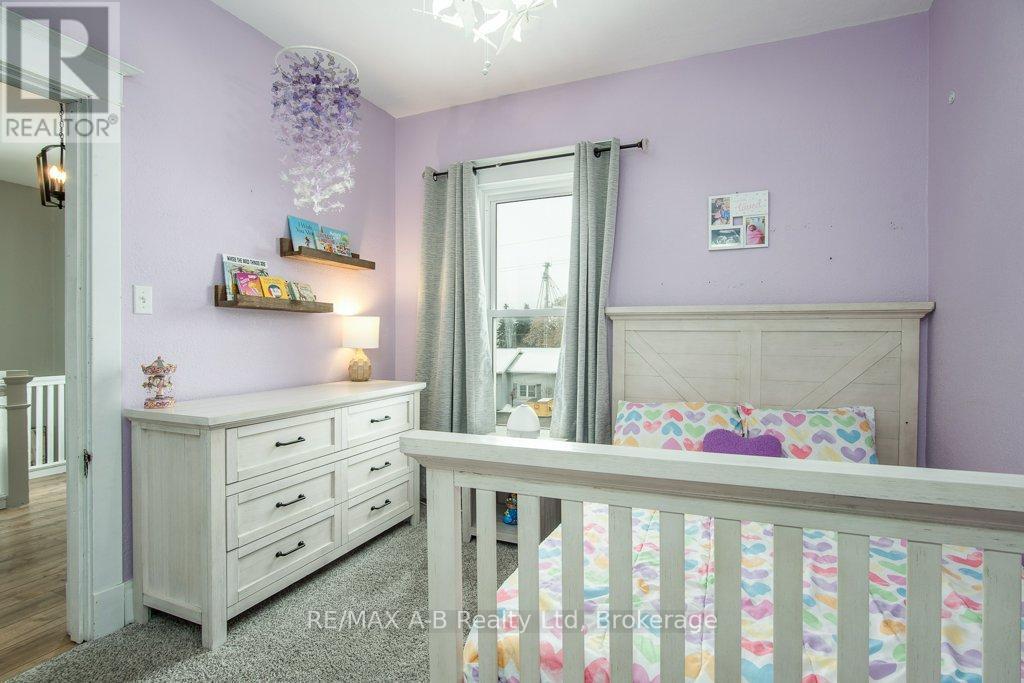 2 Loveys Street E, East Zorra-Tavistock (Hickson), ON - Indoor Photo Showing Bedroom