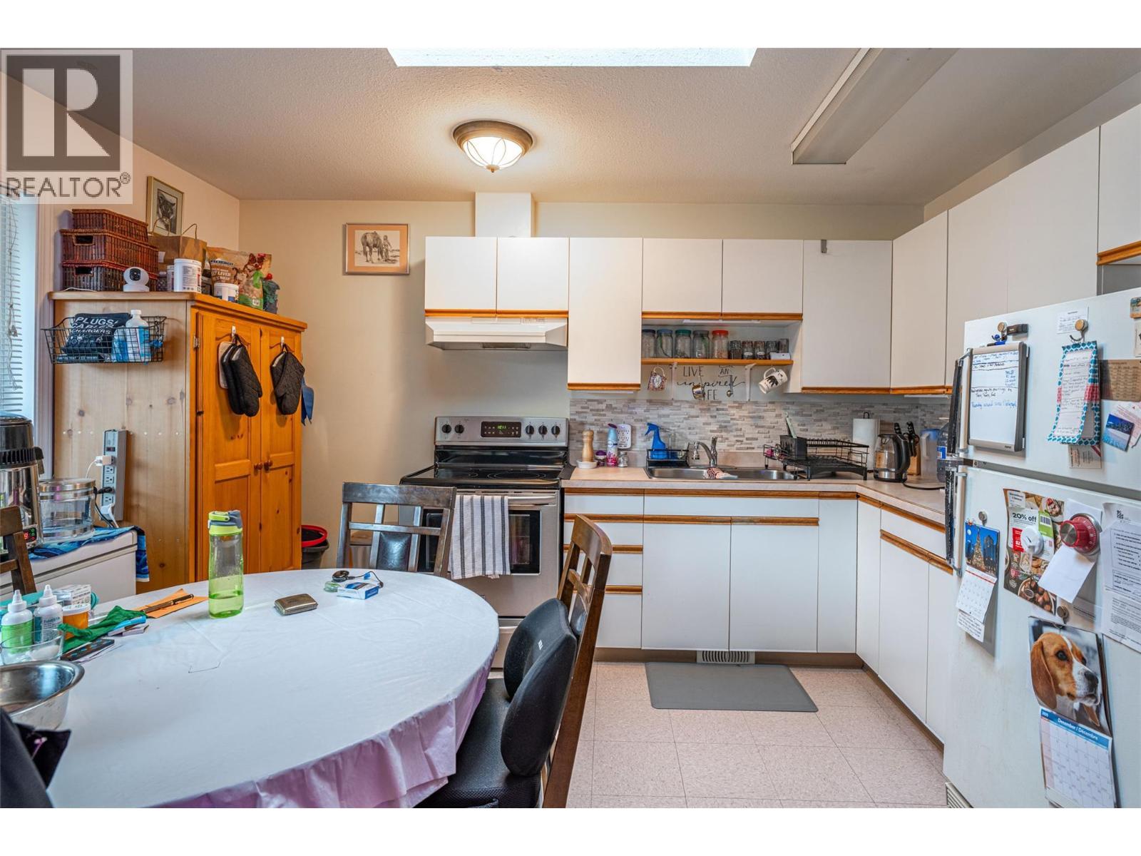 5683 97 Highway, Falkland, BC - Indoor Photo Showing Kitchen With Double Sink