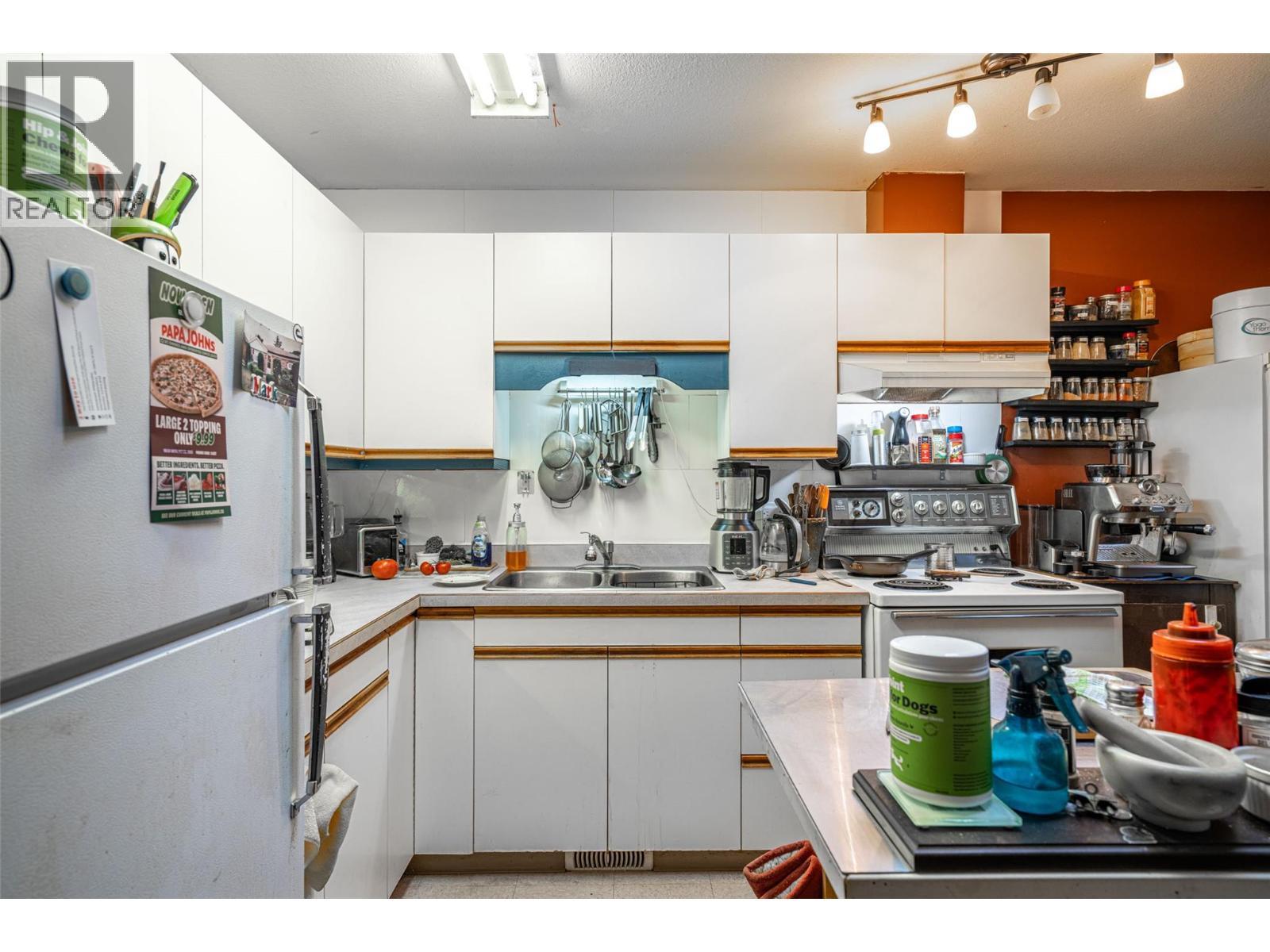5683 97 Highway, Falkland, BC - Indoor Photo Showing Kitchen With Double Sink