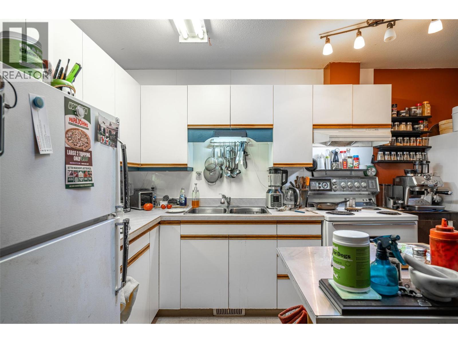 5683 97 Highway, Falkland, BC - Indoor Photo Showing Kitchen With Double Sink