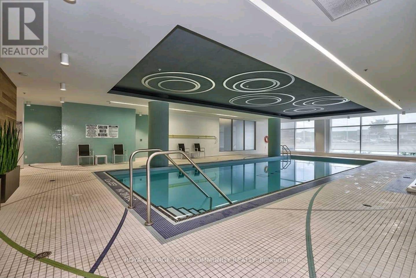 604 - 55 Speers Road, Oakville, ON - Indoor Photo Showing Other Room With In Ground Pool