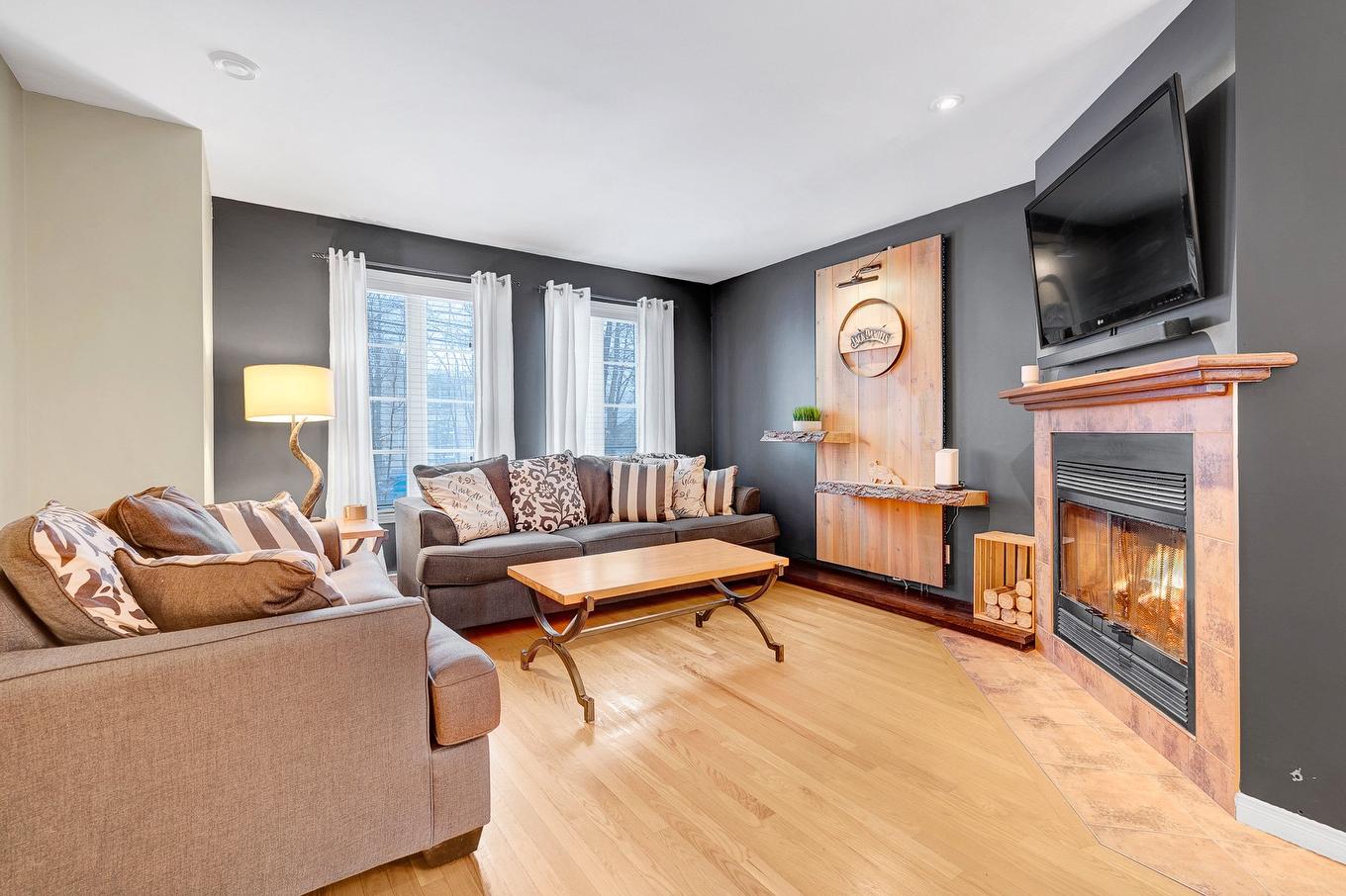 Salon - 1062 Rue Principale, Prévost, QC - Indoor Photo Showing Living Room With Fireplace
