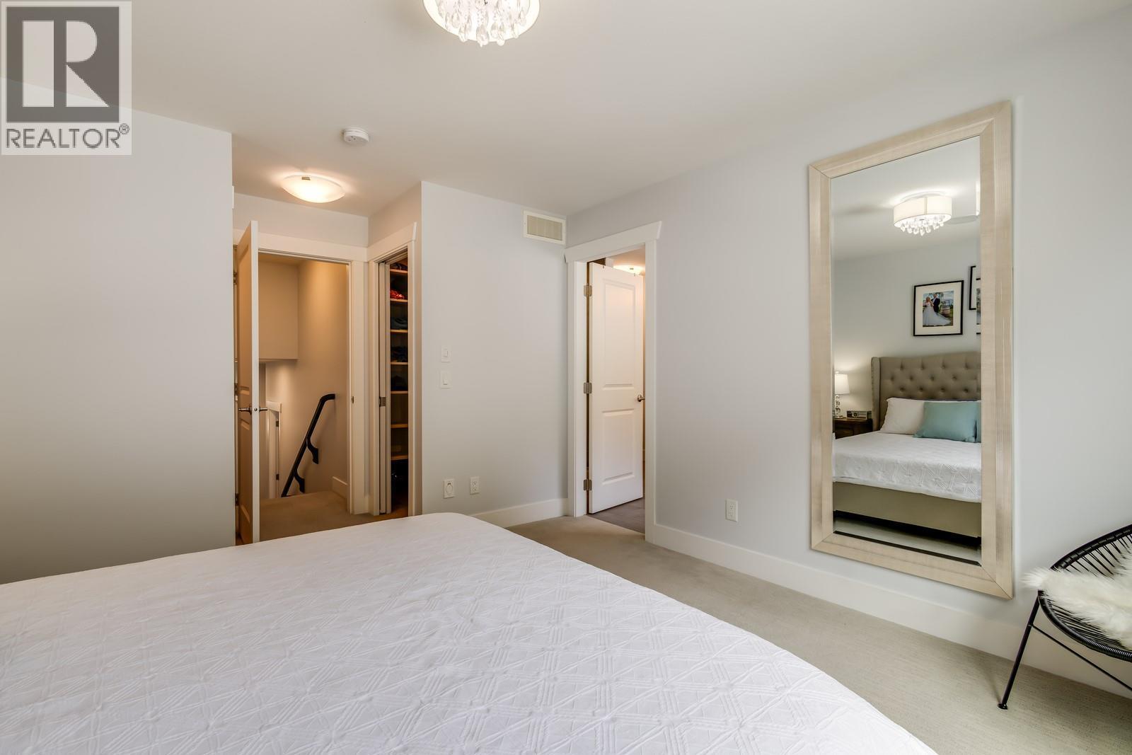 Primary bedroom & ensuite entrance - 3118 Riesling Way, West Kelowna, BC