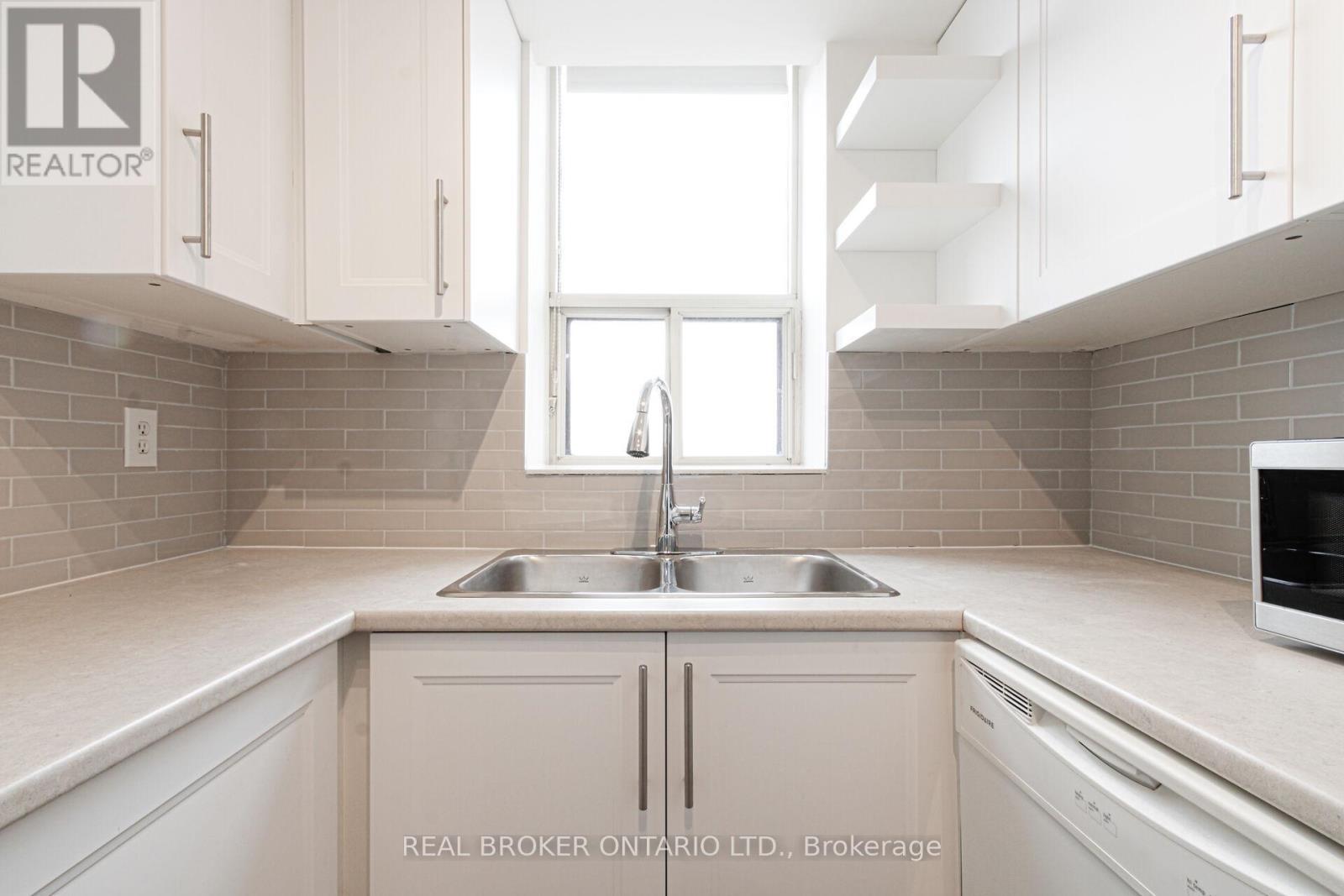 1914 - 1270 Maple Crossing Boulevard, Burlington, ON - Indoor Photo Showing Kitchen With Double Sink
