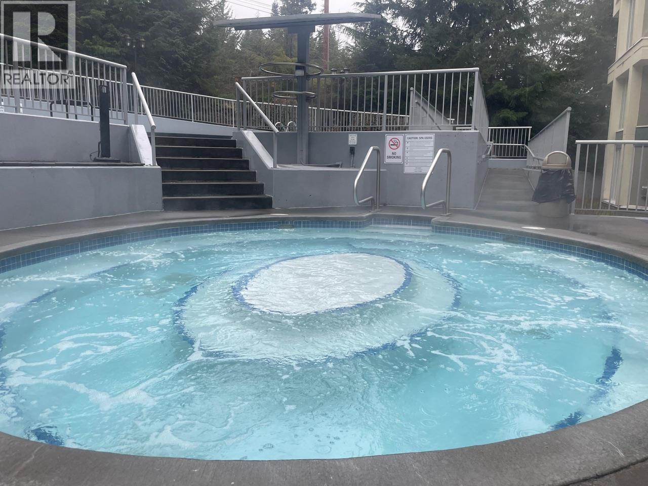 304 Week 2-4910 Spearhead Place, Whistler, BC - Indoor Photo Showing Other Room With In Ground Pool