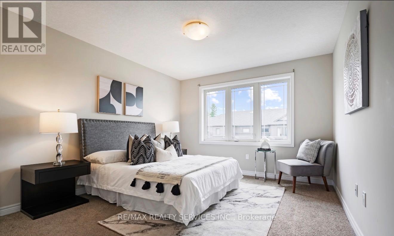 28 - 24 Lawson Street, East Luther Grand Valley, ON - Indoor Photo Showing Bedroom