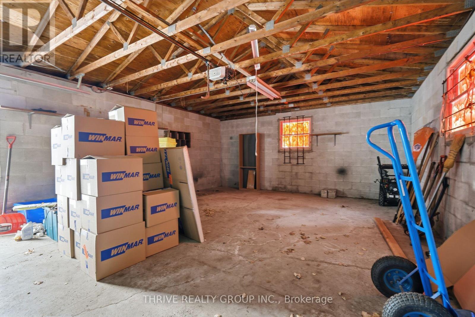 Inside Oversized Double Car Detached Garage - 64 Jena Crescent, London East (East I), ON