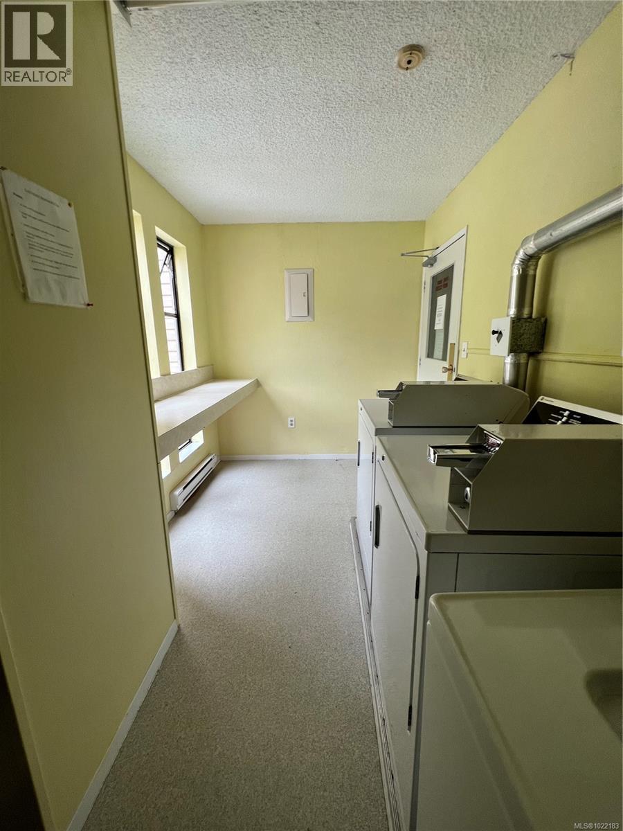 shared laundry - 202 651 Maquinna Dr N, Tahsis, BC - Indoor Photo Showing Laundry Room