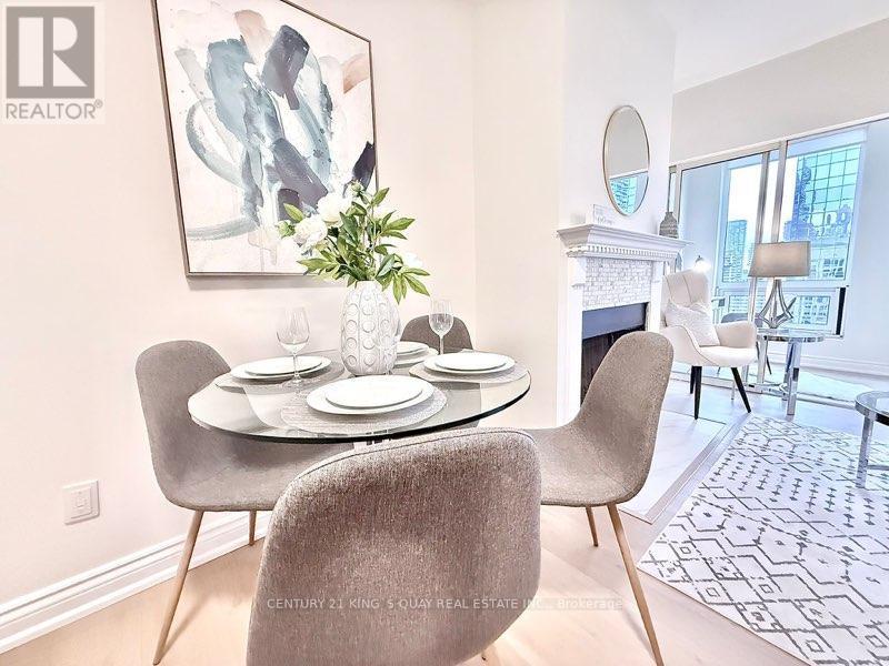 Lph2 - 25 Grenville Street, Toronto, ON - Indoor Photo Showing Dining Room With Fireplace