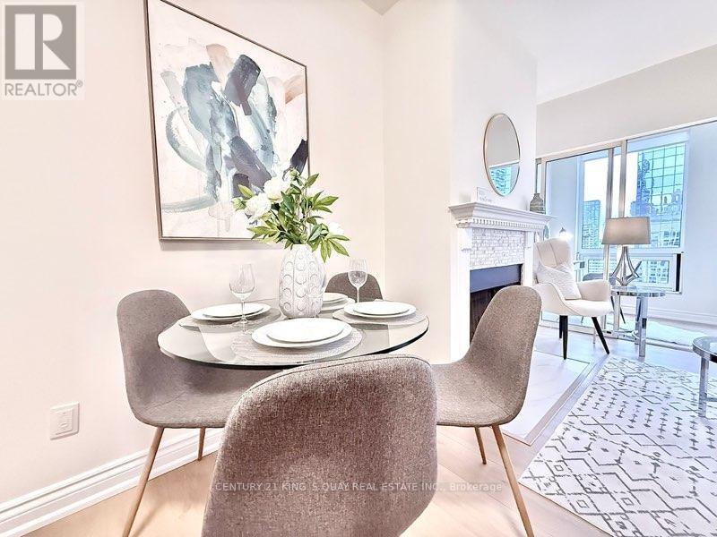 Lph2 - 25 Grenville Street, Toronto, ON - Indoor Photo Showing Dining Room With Fireplace