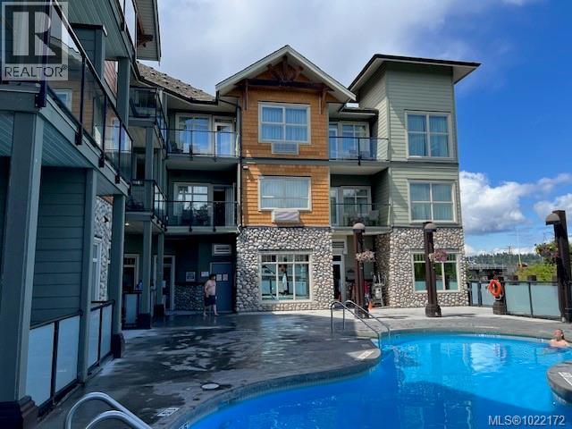 103D 1800 Riverside Lane, Courtenay, BC - Outdoor With In Ground Pool With Facade