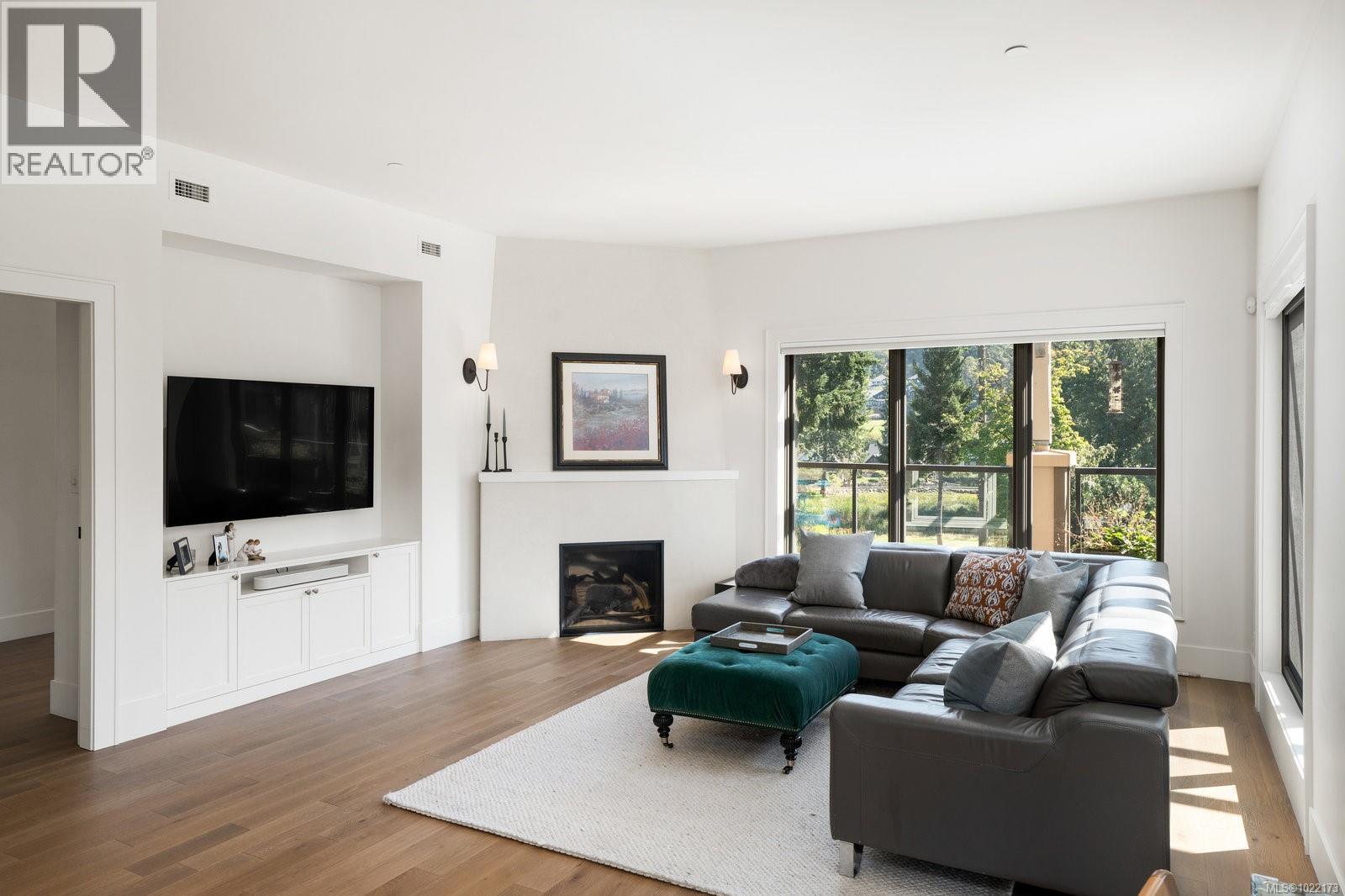 416 1335 Bear Mountain Pkwy, Langford, BC - Indoor Photo Showing Living Room With Fireplace