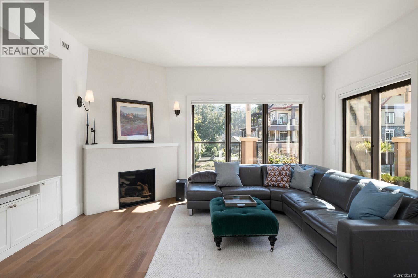 416 1335 Bear Mountain Pkwy, Langford, BC - Indoor Photo Showing Living Room With Fireplace