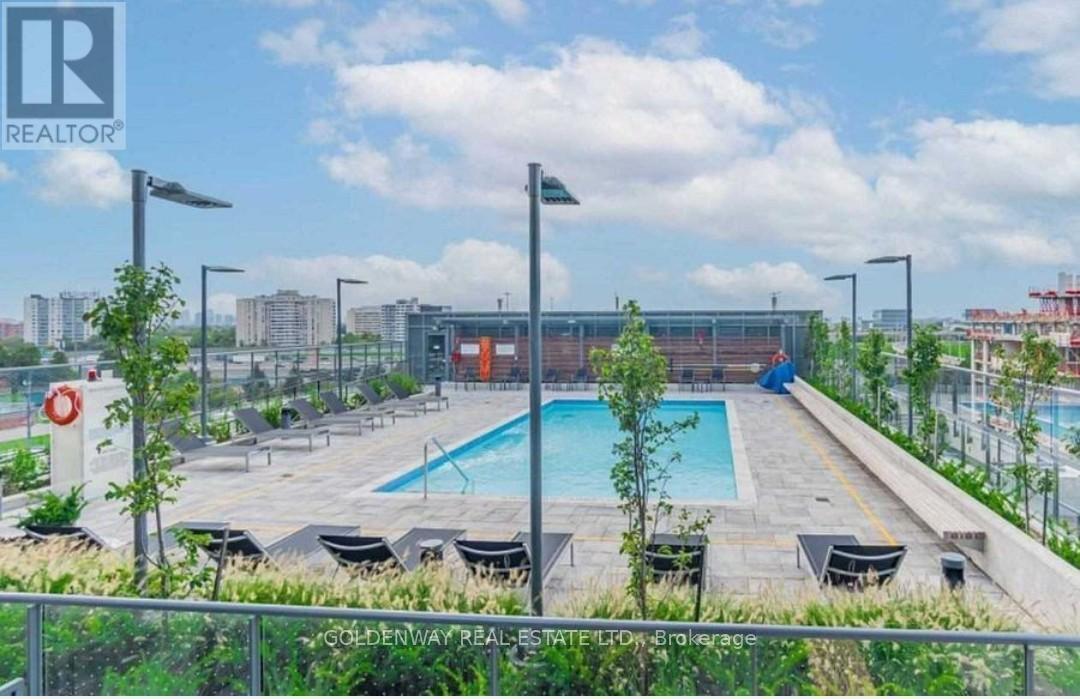 321 - 31 Tippett Road, Toronto, ON - Outdoor With In Ground Pool With View