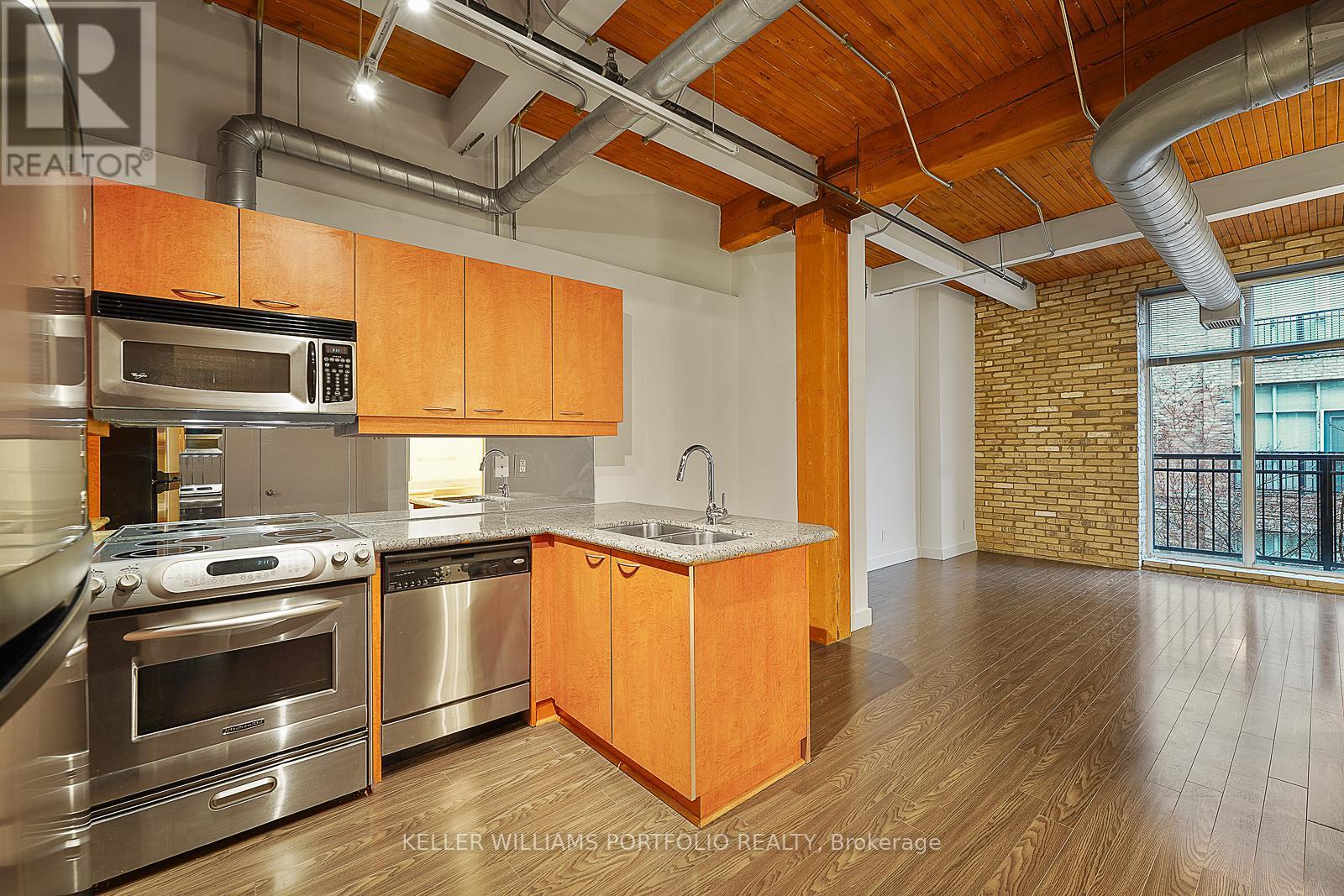 324 - 955 Queen Street W, Toronto, ON - Indoor Photo Showing Kitchen With Double Sink