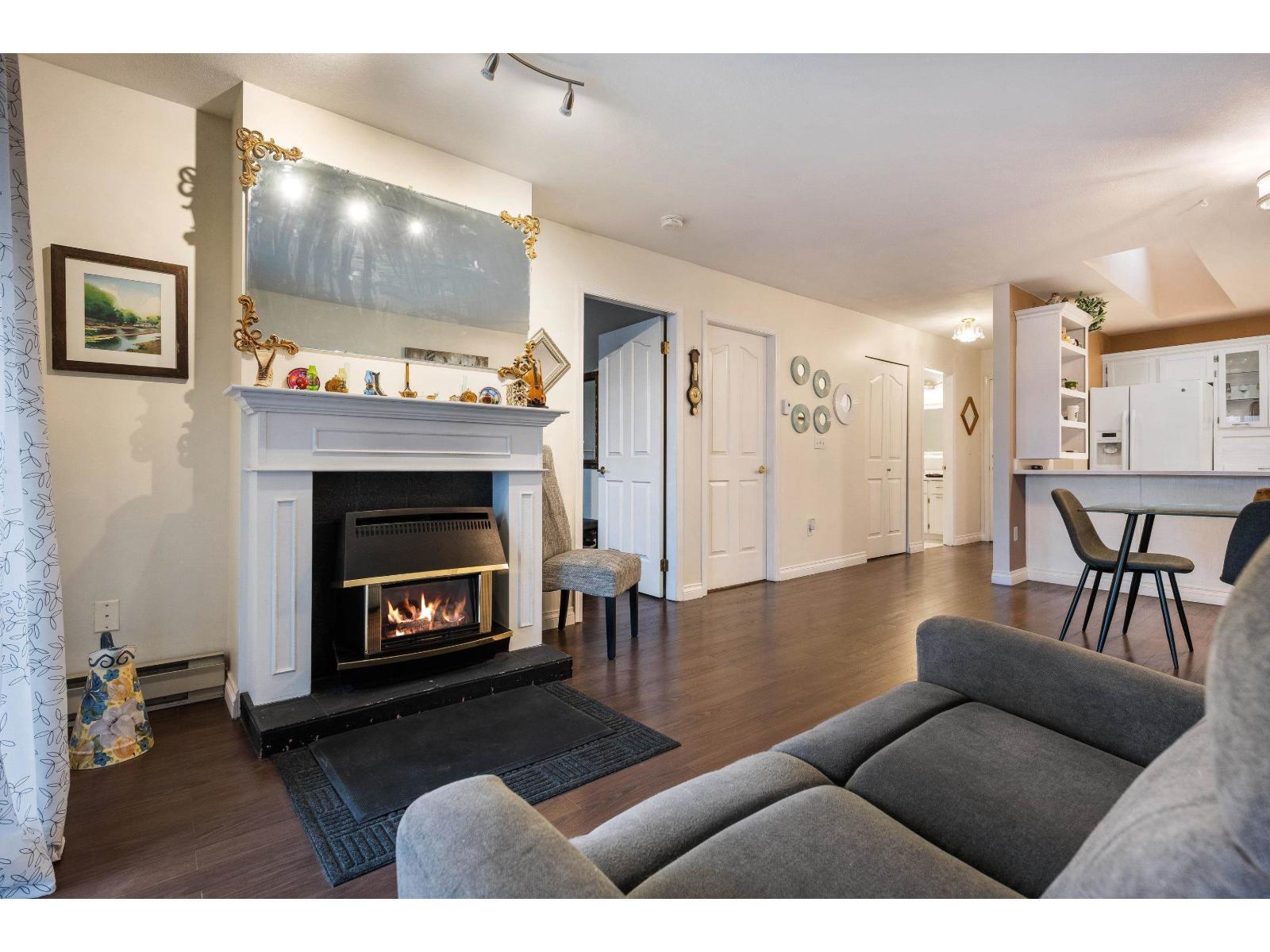 307 45660 Knight Road|Sardis West Vedder, Chilliwack, BC - Indoor Photo Showing Living Room With Fireplace