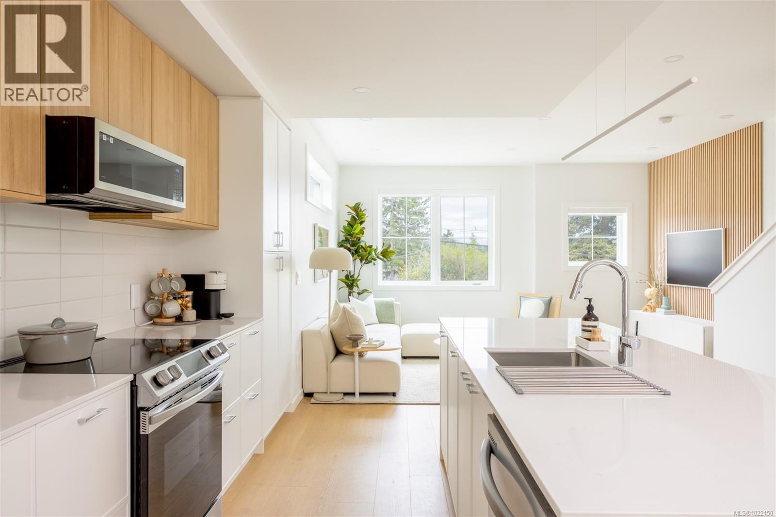 *Different floorplan, similar finishings - Th9 3450 Whittier Ave, Saanich, BC - Indoor Photo Showing Kitchen With Upgraded Kitchen