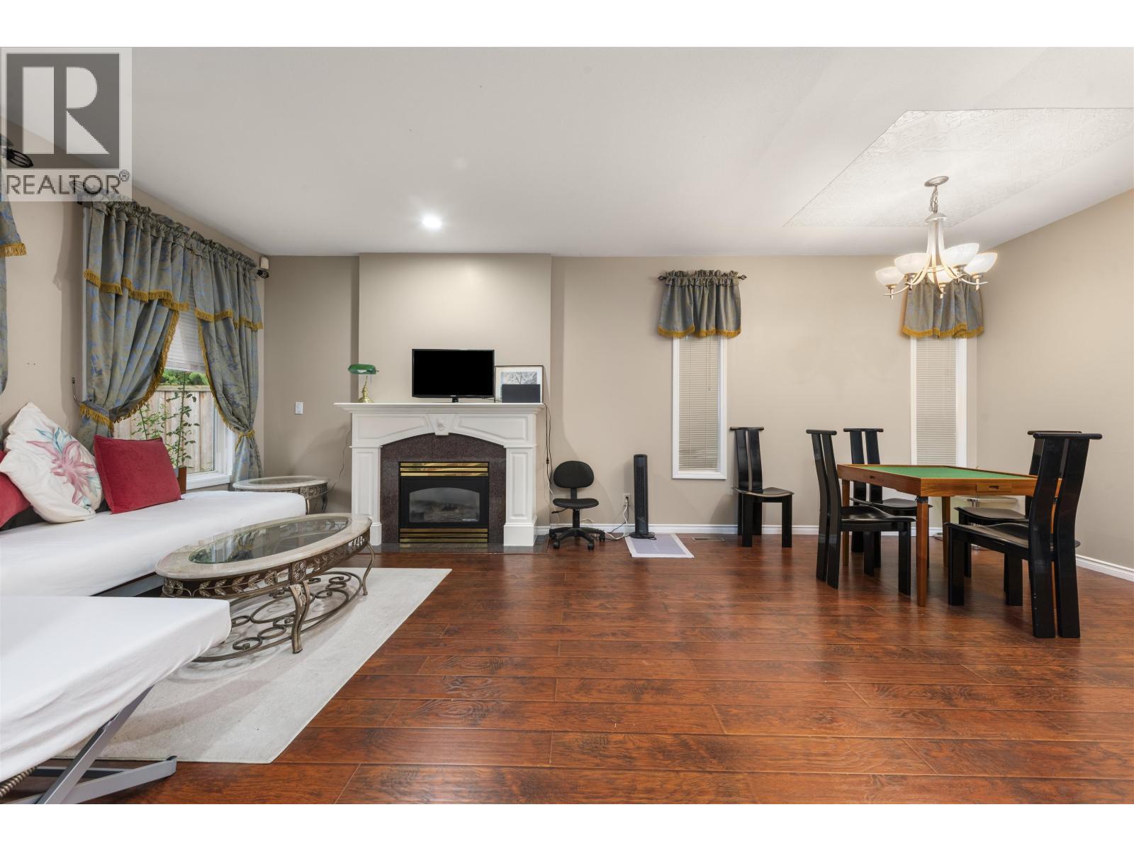 10231 Cambie Road, Richmond, BC - Indoor Photo Showing Living Room With Fireplace