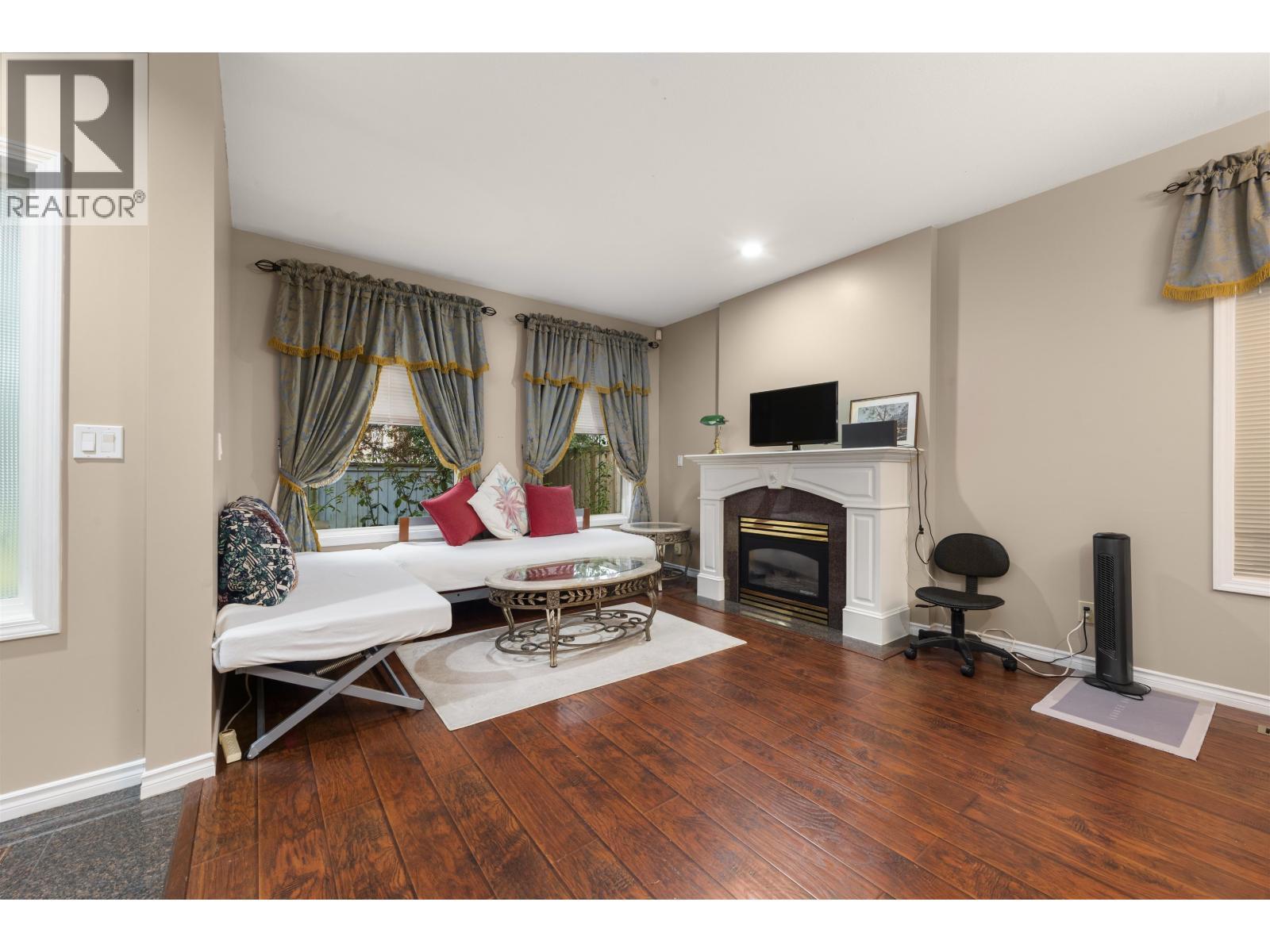 10231 Cambie Road, Richmond, BC - Indoor Photo Showing Other Room With Fireplace