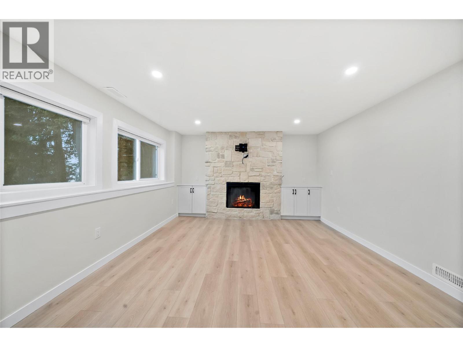 2022 Eagle Bay Road, Blind Bay, BC - Indoor Photo Showing Living Room With Fireplace
