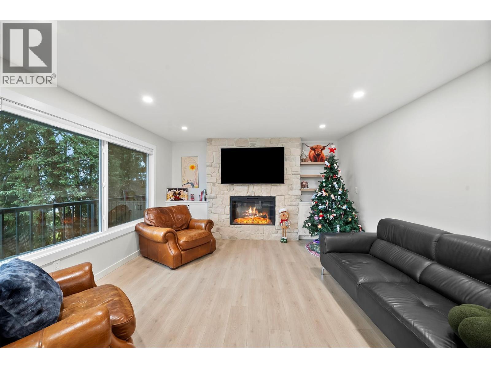 2022 Eagle Bay Road, Blind Bay, BC - Indoor Photo Showing Living Room With Fireplace