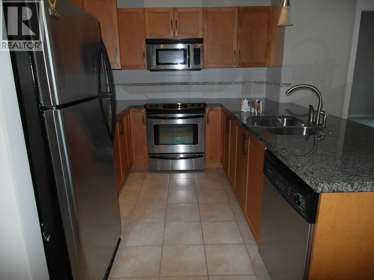 405 12350 Harris Rd, Pitt Meadows, BC - Indoor Photo Showing Kitchen With Stainless Steel Kitchen With Double Sink
