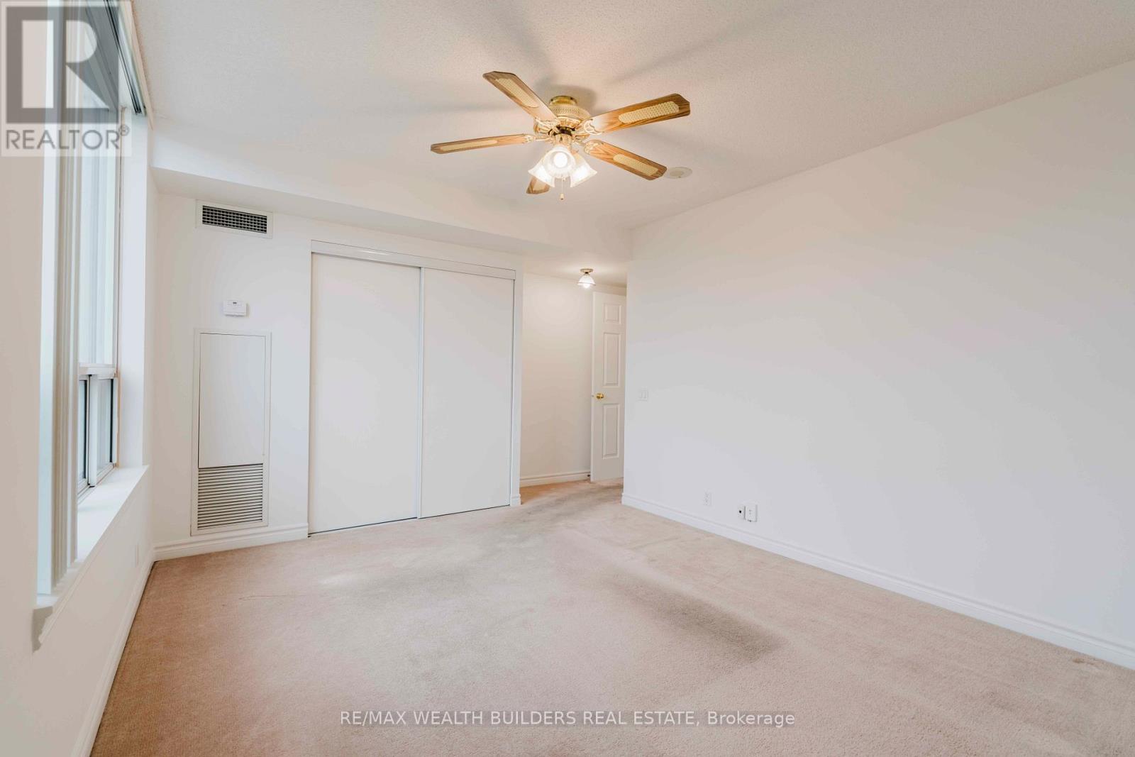 Non Virtually Staged Second Bedroom - 305 - 1720 Eglinton Avenue E, Toronto, ON - Indoor Photo Showing Other Room