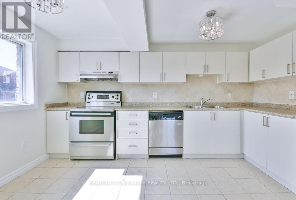 2 - 87 Goodwin Drive, Barrie, ON - Indoor Photo Showing Kitchen With Stainless Steel Kitchen