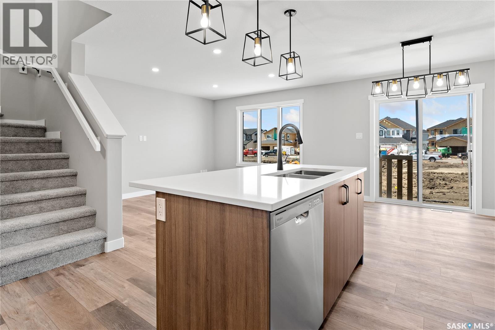 117 Yuel Crescent, Saskatoon, SK - Indoor Photo Showing Kitchen With Double Sink