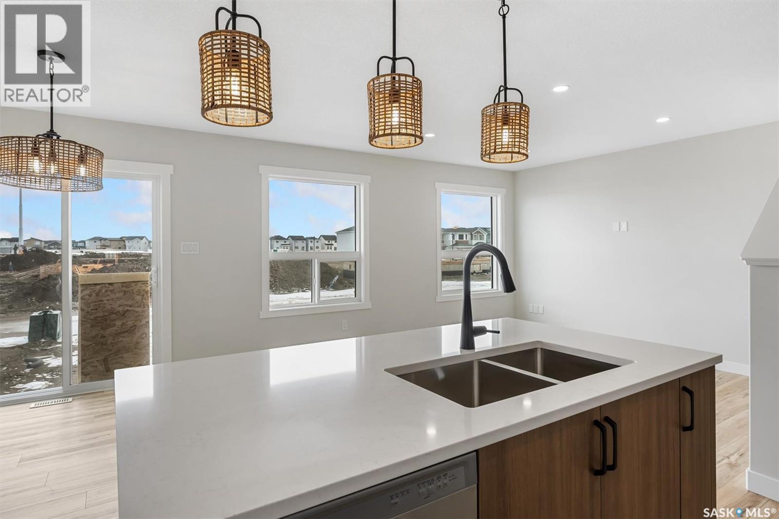 222 Yuel Lane, Saskatoon, SK - Indoor Photo Showing Kitchen With Double Sink