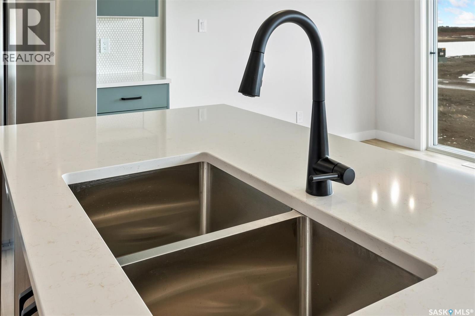 222 Yuel Lane, Saskatoon, SK - Indoor Photo Showing Kitchen With Double Sink