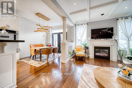 3095 Robert Brown Boulevard, Oakville, ON - Indoor Photo Showing Living Room With Fireplace