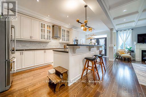 3095 Robert Brown Boulevard, Oakville, ON - Indoor Photo Showing Kitchen With Fireplace With Upgraded Kitchen