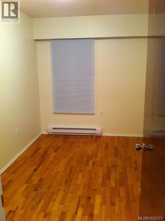 Side A third bedroom - A & B 1725 Feltham Rd, Saanich, BC - Indoor Photo Showing Other Room