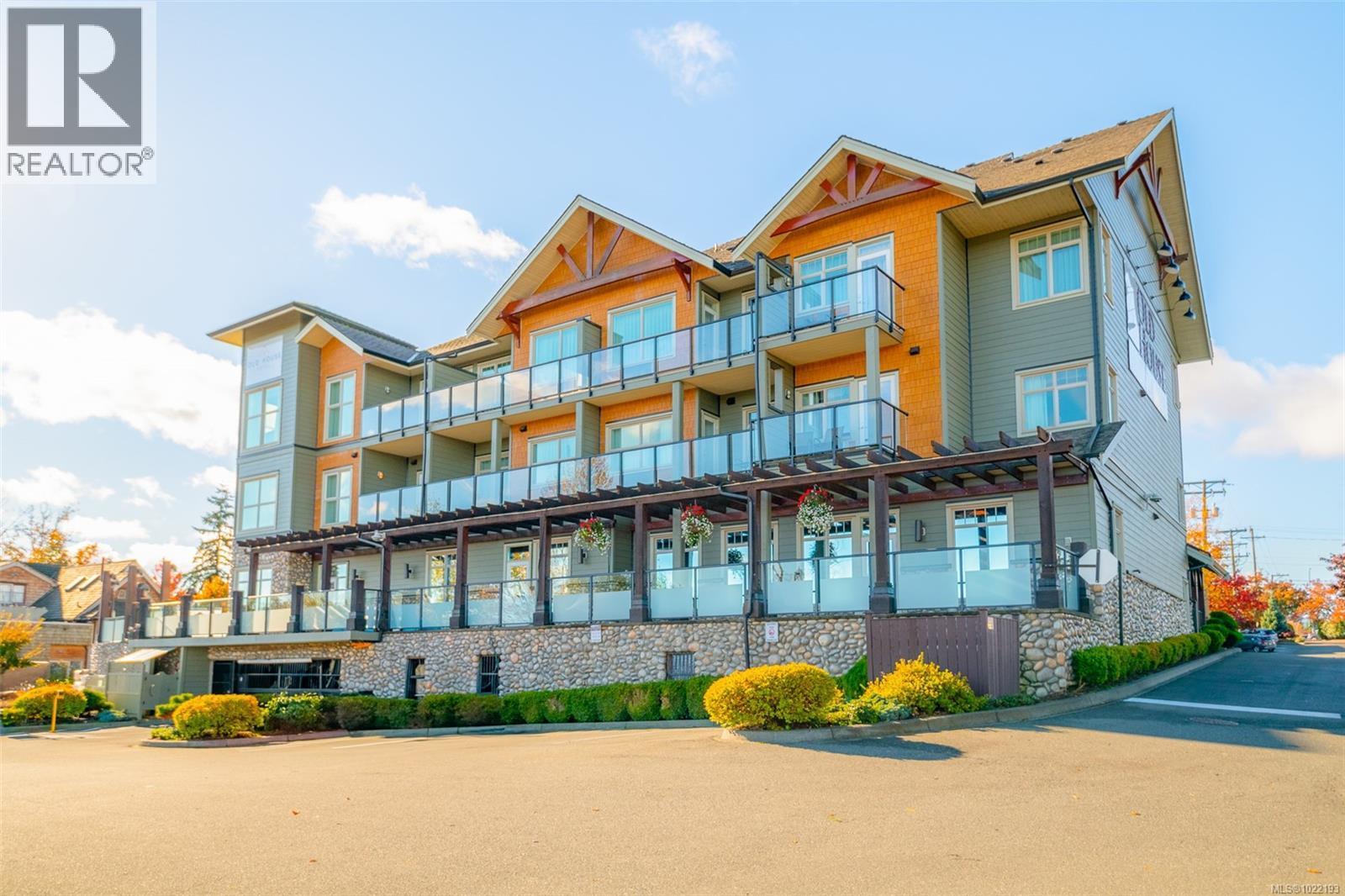 1730 Riverside Land - 310D 1730 Riverside Lane, Courtenay, BC - Outdoor With Balcony With Facade