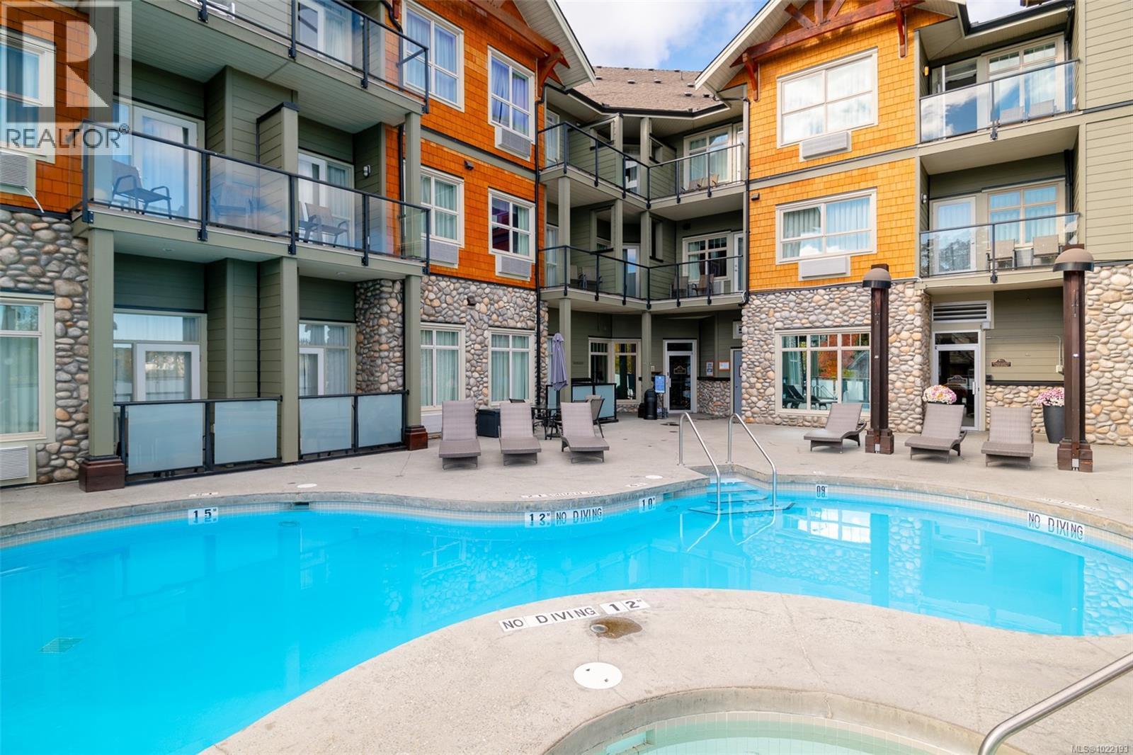 Pool - 310D 1730 Riverside Lane, Courtenay, BC - Outdoor With In Ground Pool With Balcony