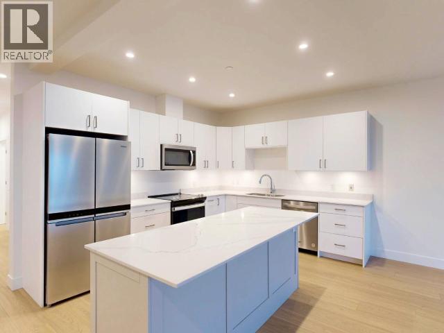 C203-6900 Burnaby Street, Powell River, BC - Indoor Photo Showing Kitchen With Upgraded Kitchen