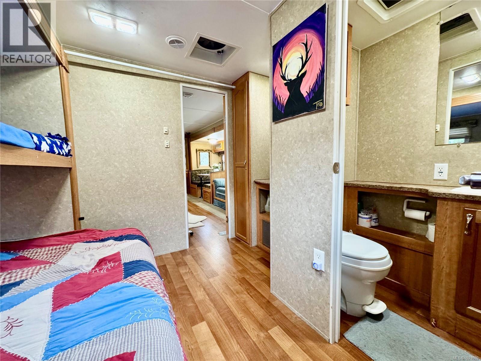 Bunkbed room at the front of the trailer with it's own bathroom - 19 8631 South Shore Rd, Lake Cowichan, BC