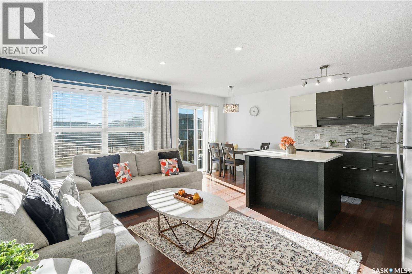 106 410 Ledingham Way, Saskatoon, SK - Indoor Photo Showing Living Room