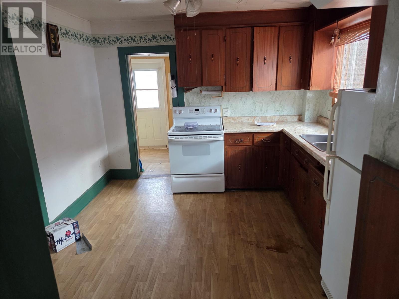 38 Junction Road, Grand Falls Windsor, NL - Indoor Photo Showing Kitchen With Double Sink