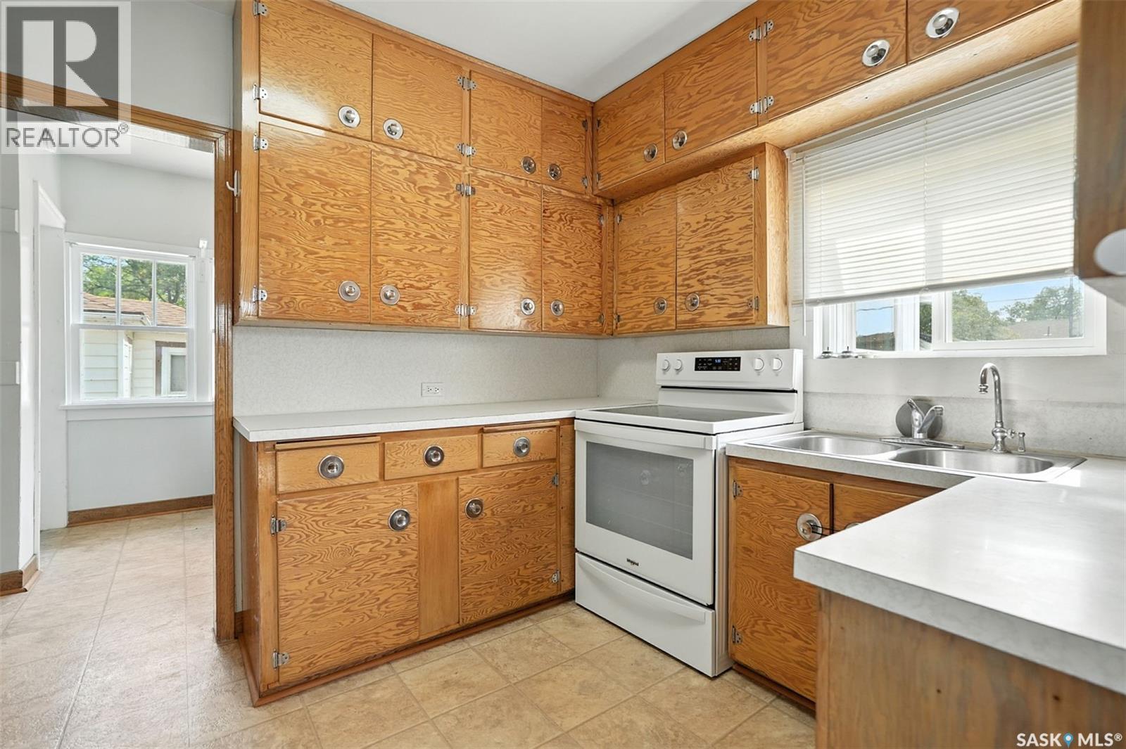 106 3Rd Avenue E, Nokomis, SK - Indoor Photo Showing Kitchen With Double Sink