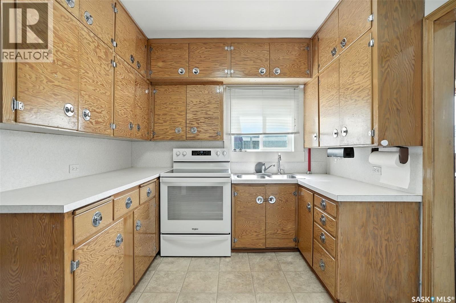 106 3Rd Avenue E, Nokomis, SK - Indoor Photo Showing Kitchen With Double Sink